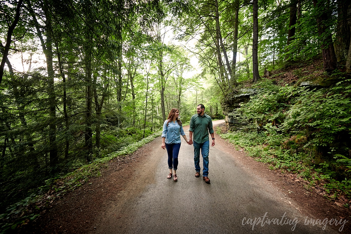 couple walking in woods