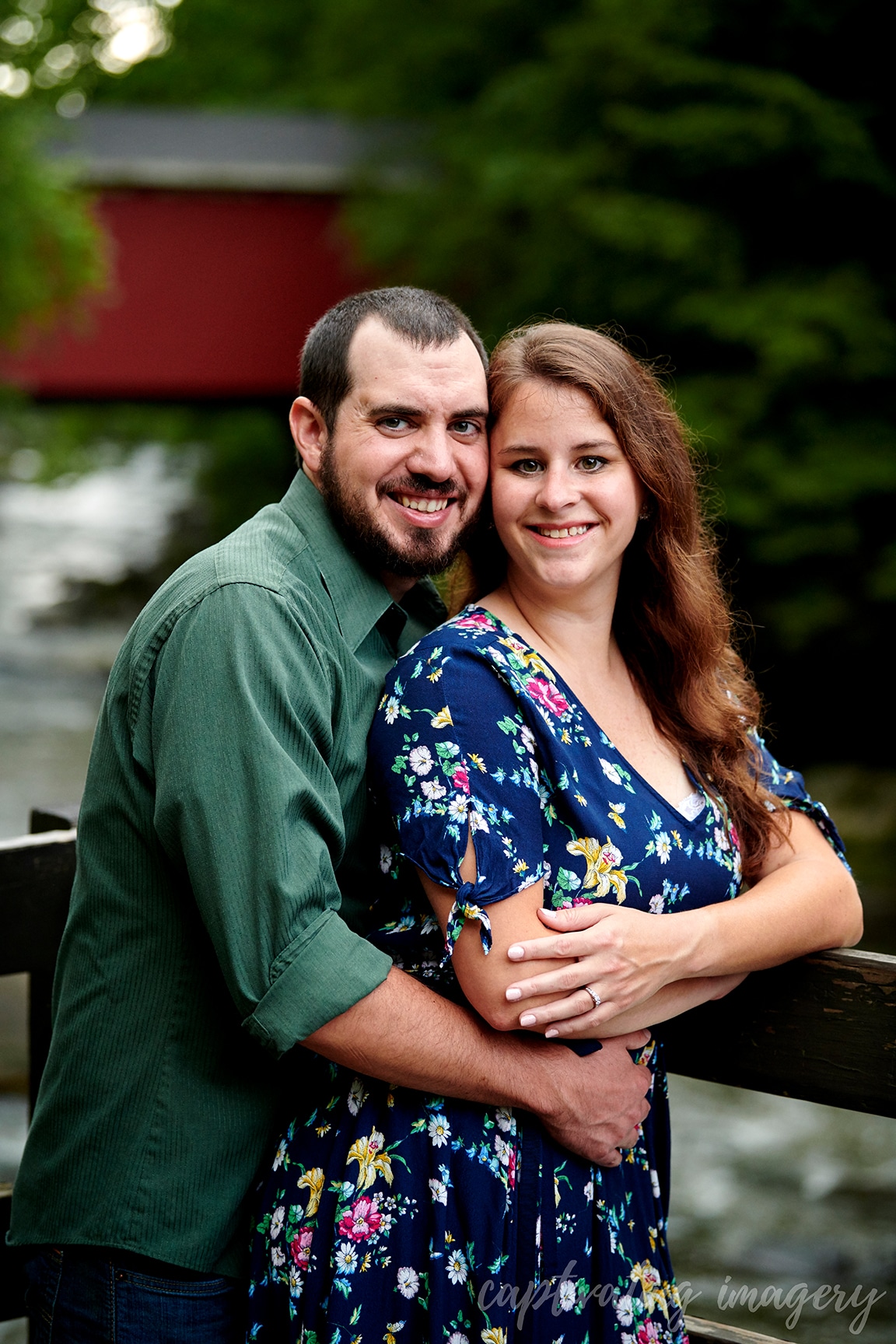 couple together on bridge