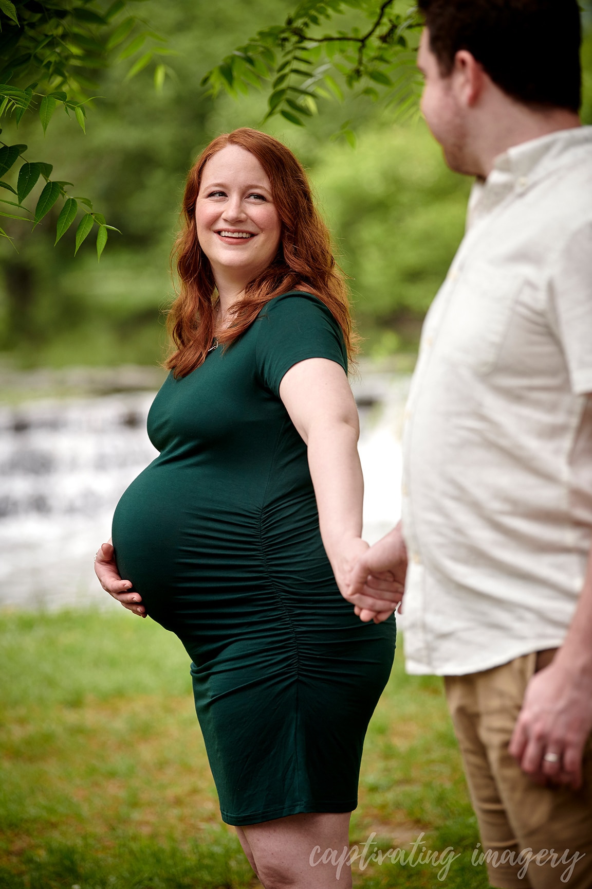 mom-to-be looks at dad