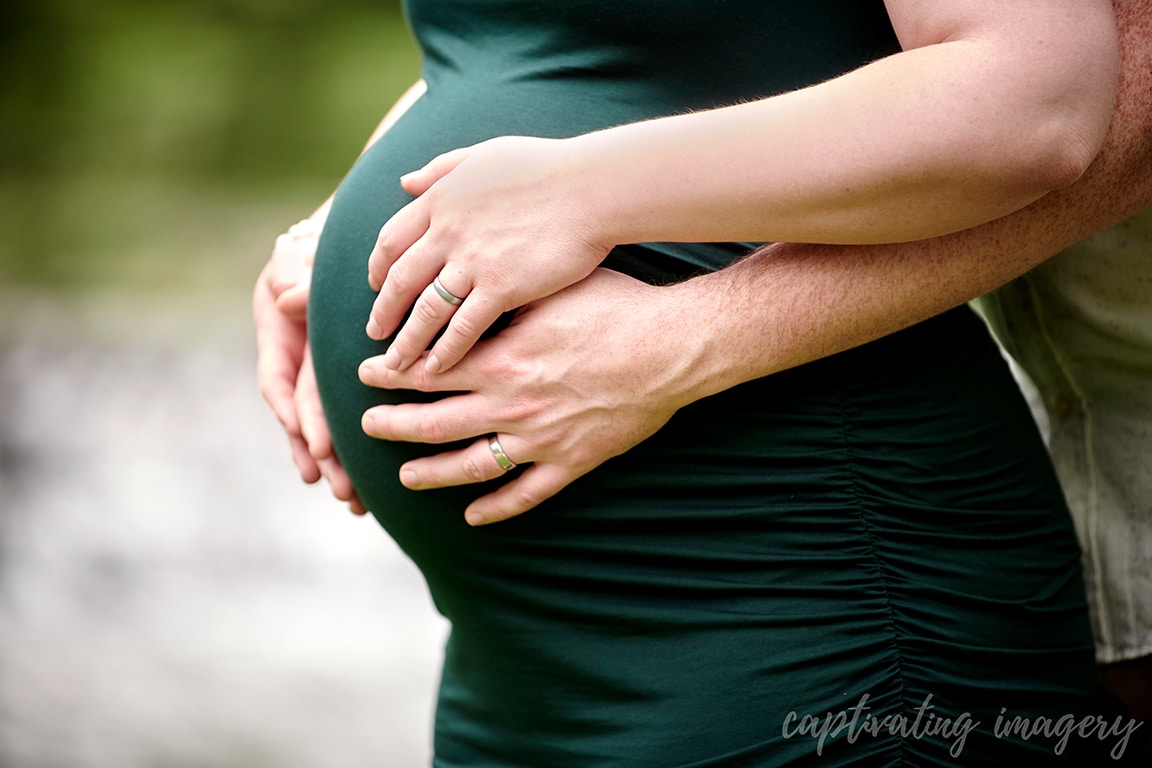 close-up of parents' hands