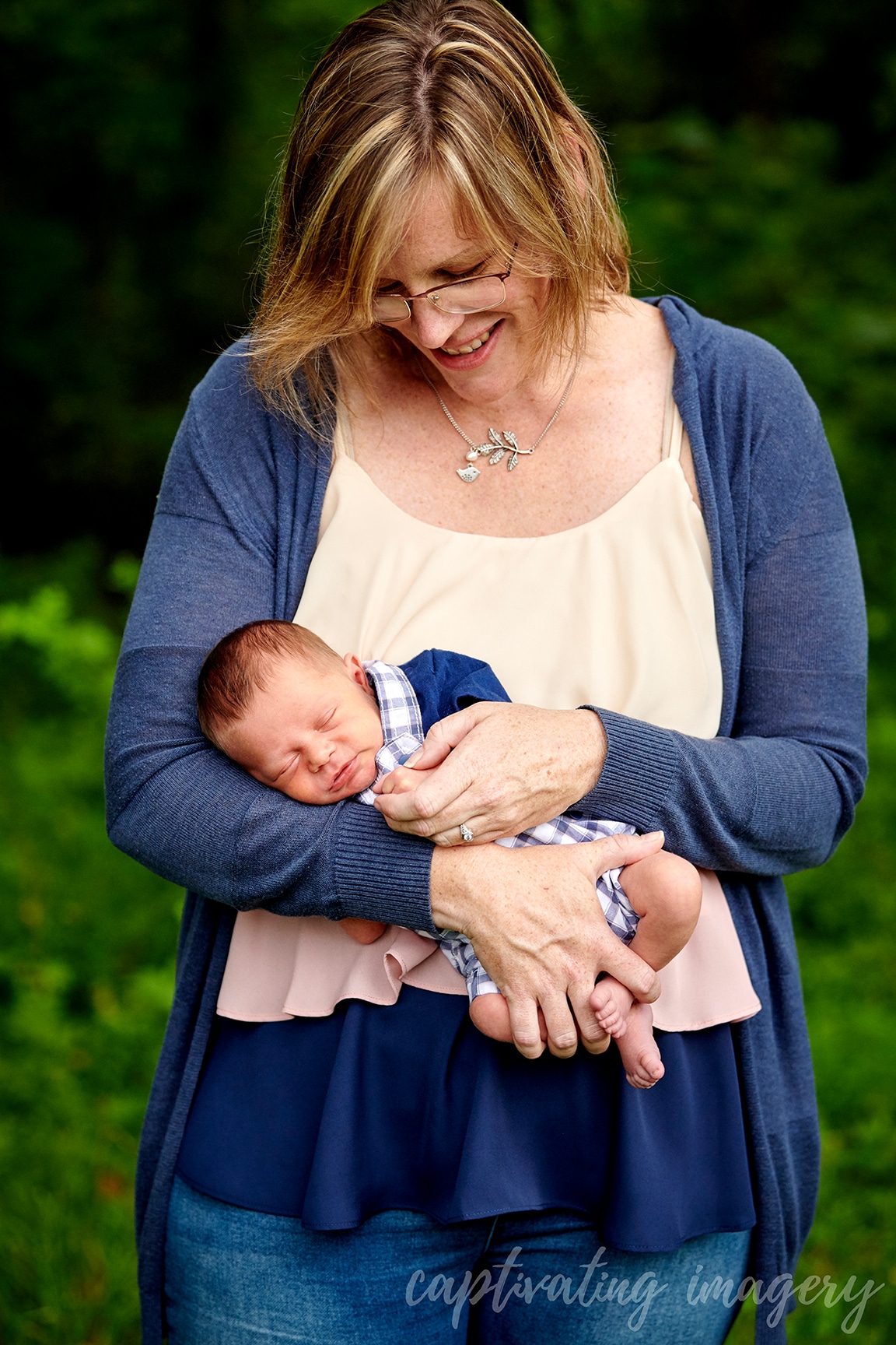 mom holding baby